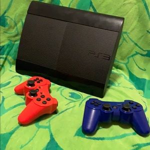 PS3 with two gaming controls. Plus all cables.